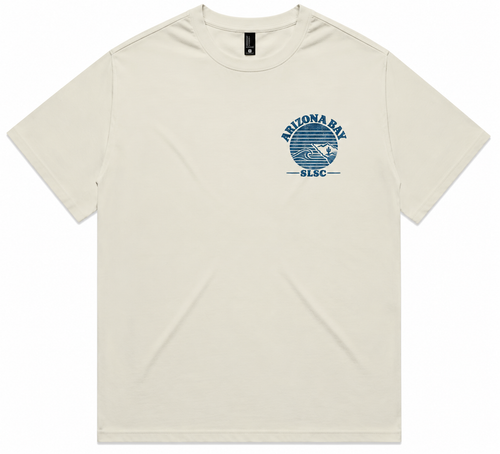 Front view of the Arizona Bay Surf Life Saving Club men’s tee in ecru, showing the Token Tees graphic on the left of chest.